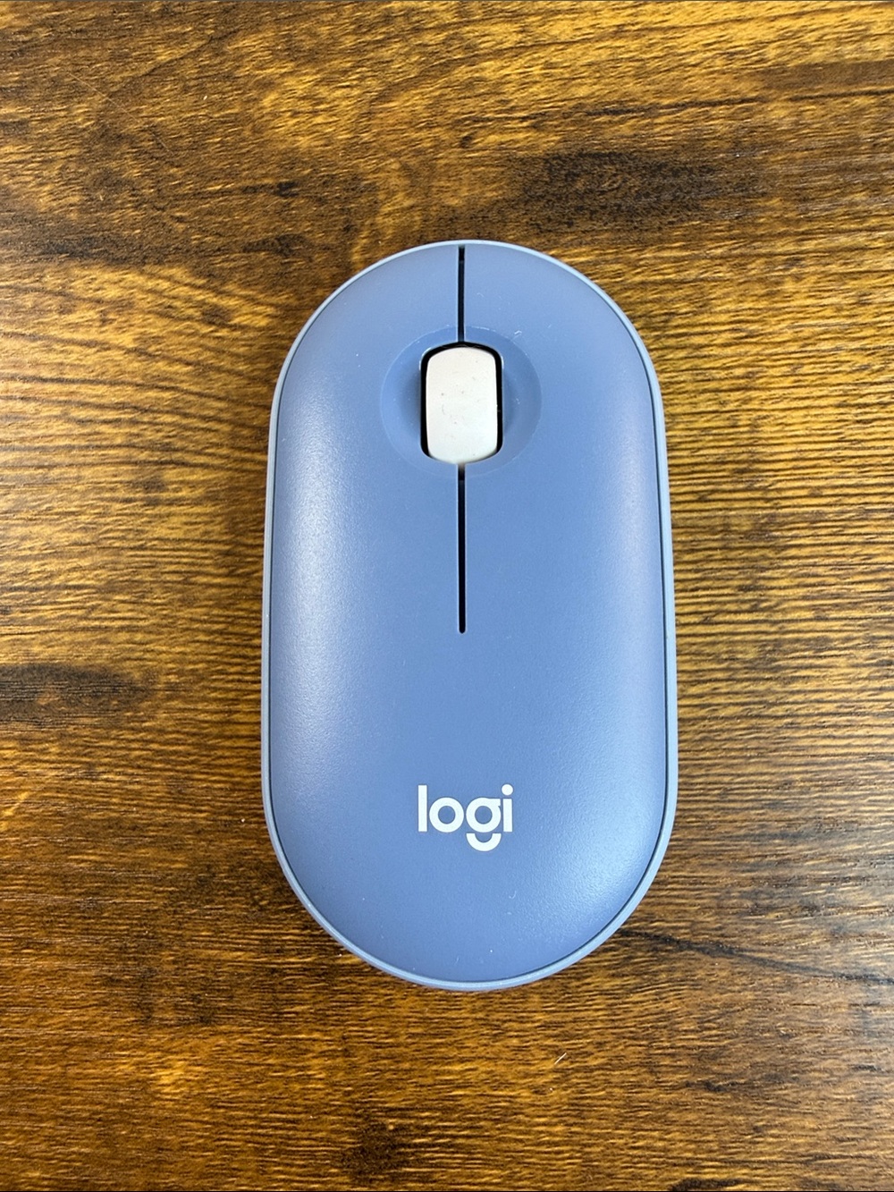Logitech Slim Wireless Mouse in Blue and White